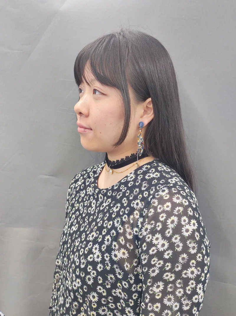 Portrait of Xinru wearing a decorative earring