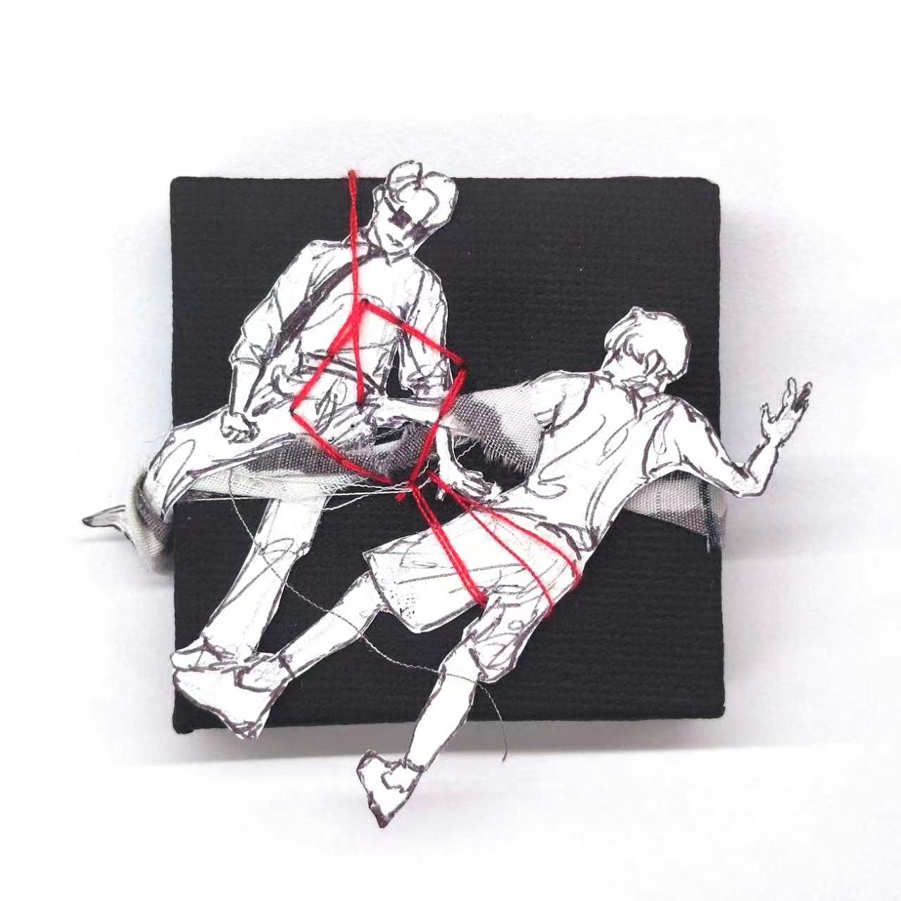 Small collage with two drawn figures tied together with red thread
